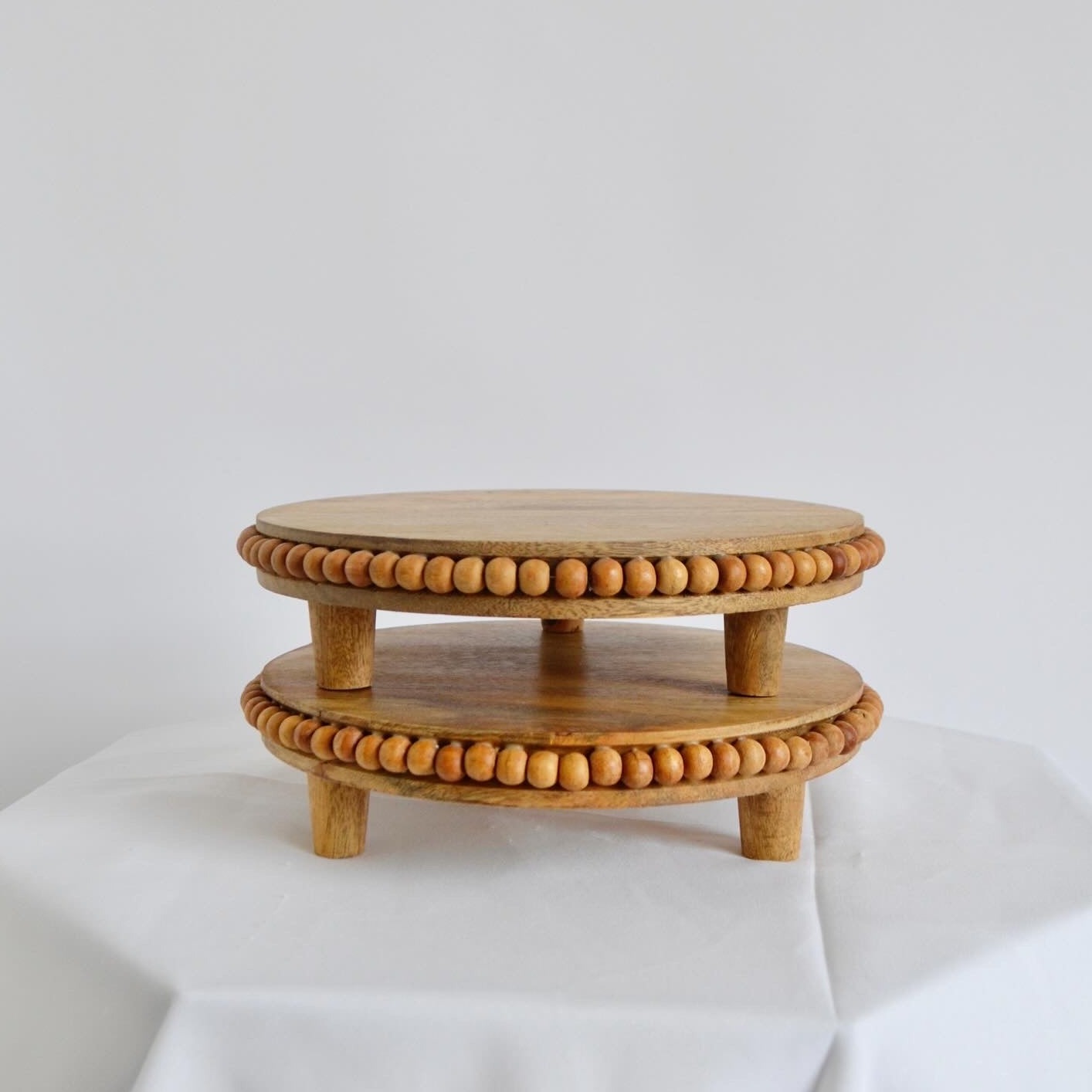 Beaded wood cake stand