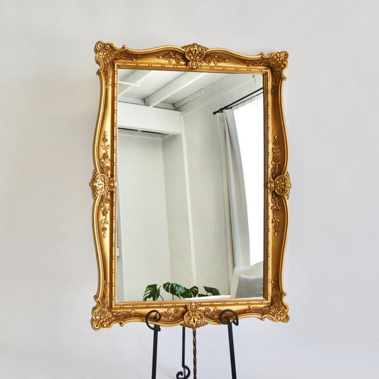 Ornate gold rectangular mirror